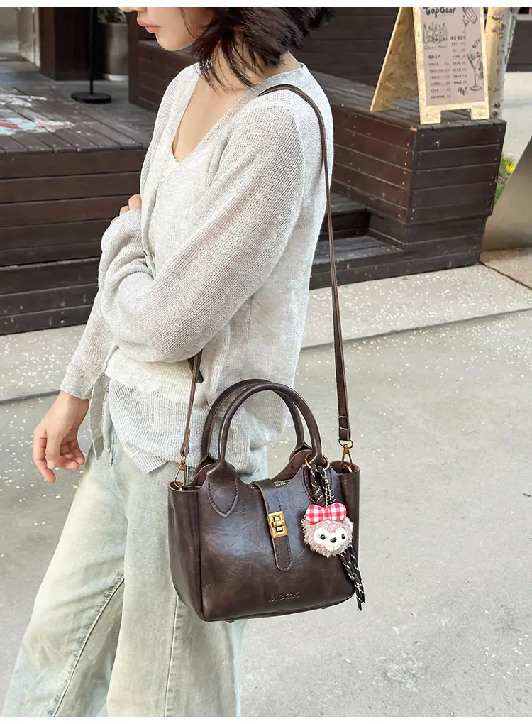 Women Pebbled Shoulder Crossbody Bag with Cute Charm — feature 21