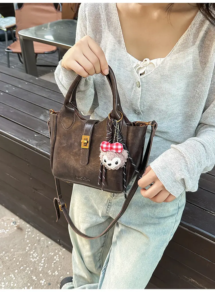 Women Pebbled Shoulder Crossbody Bag with Cute Charm — feature 22