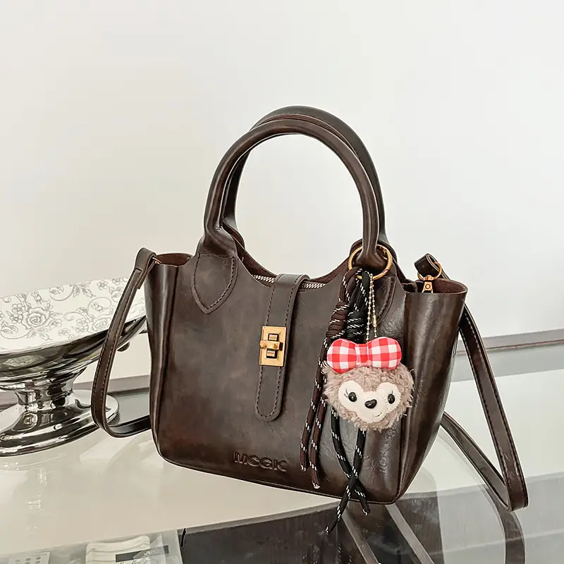 Women Pebbled Shoulder Crossbody Bag with Cute Charm - Image 2