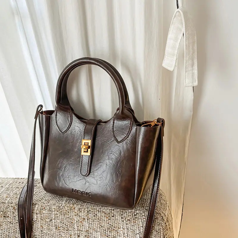 Women Pebbled Shoulder Crossbody Bag with Cute Charm - Image 5