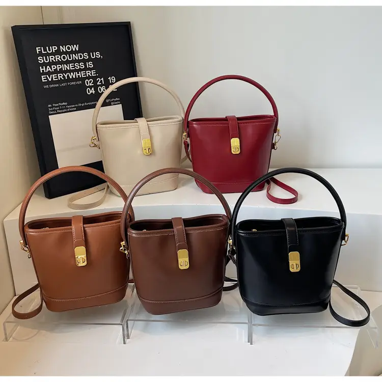 Women's Brown Leather Bucket Bag with Gold Plated Clasp — feature 1