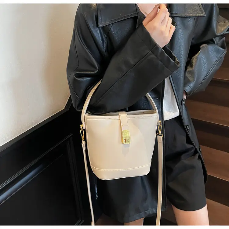 Women's Brown Leather Bucket Bag with Gold Plated Clasp — feature 11