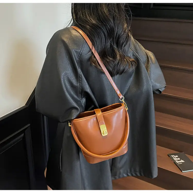Women's Brown Leather Bucket Bag with Gold Plated Clasp — feature 12
