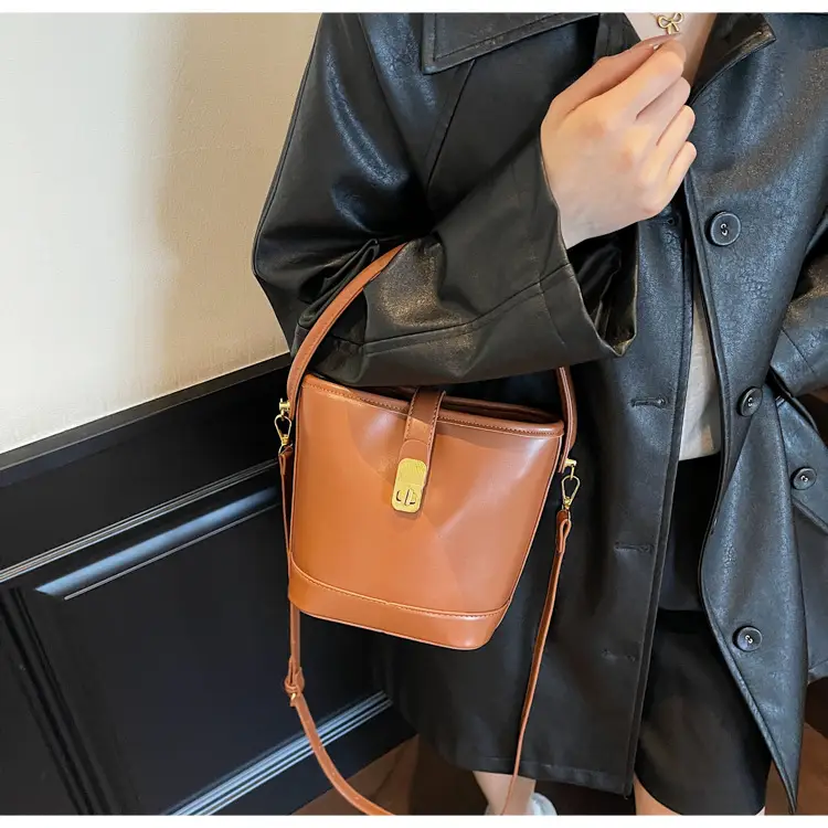 Women's Brown Leather Bucket Bag with Gold Plated Clasp — feature 14