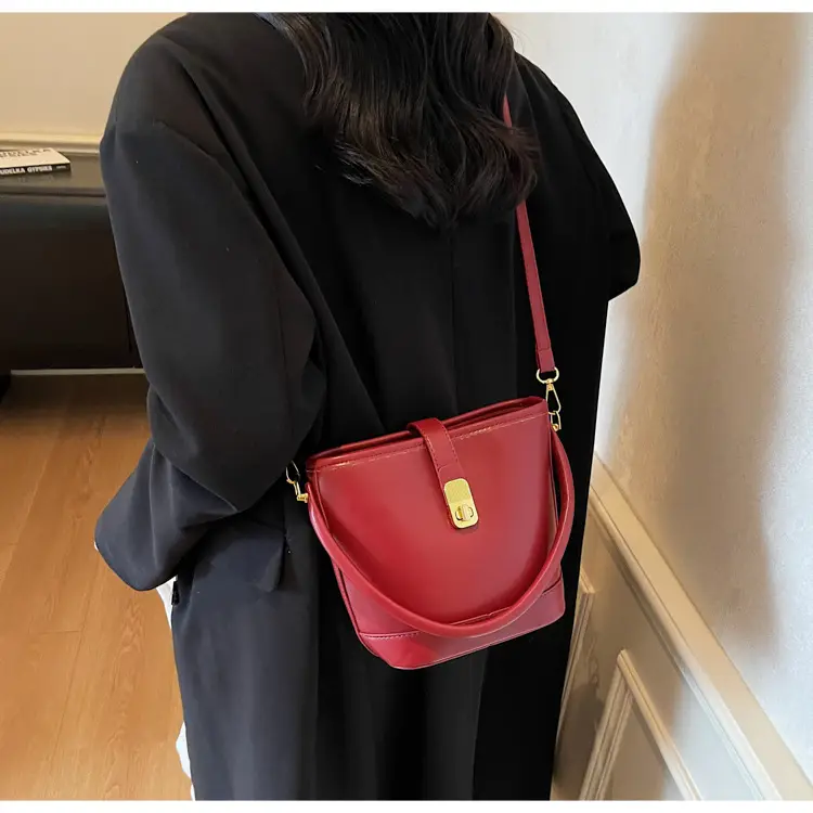 Women's Brown Leather Bucket Bag with Gold Plated Clasp — feature 16