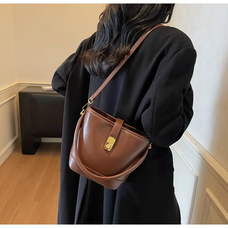 Women's Brown Leather Bucket Bag with Gold Plated Clasp — feature 18