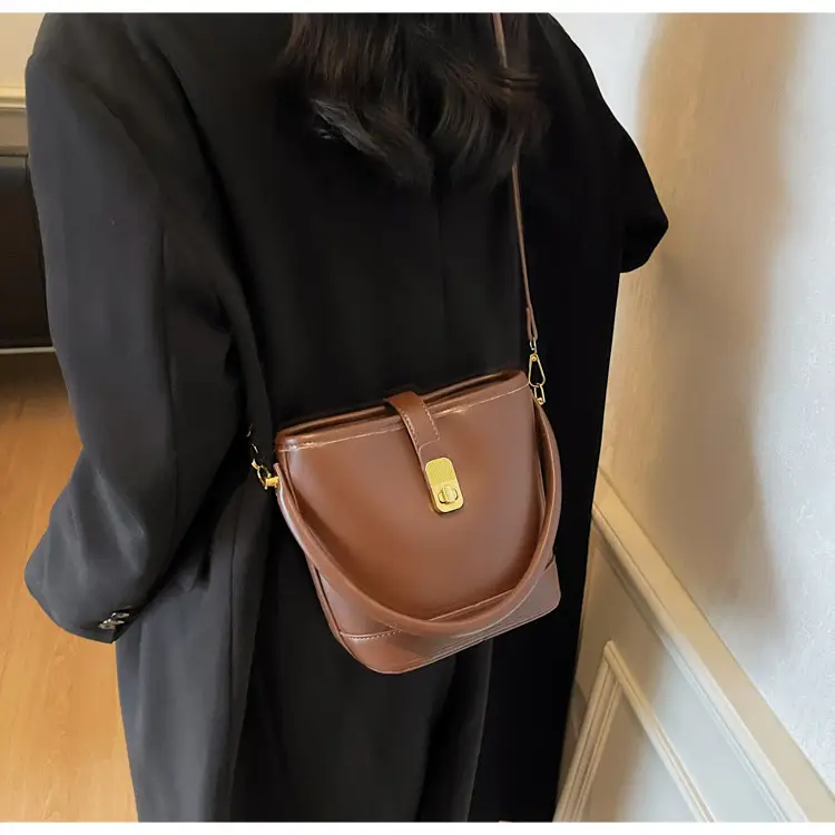 Women's Brown Leather Bucket Bag with Gold Plated Clasp — feature 19