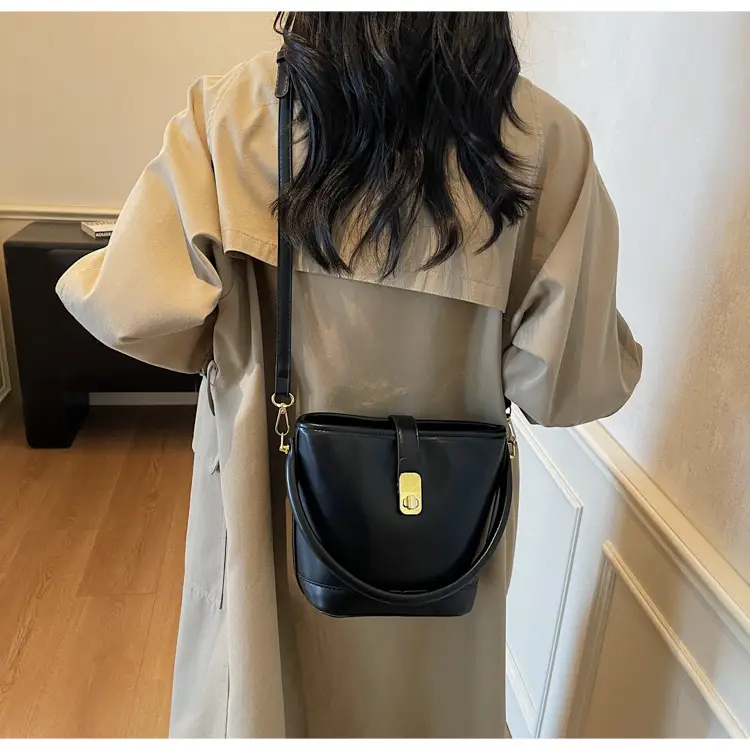 Women's Brown Leather Bucket Bag with Gold Plated Clasp — feature 21