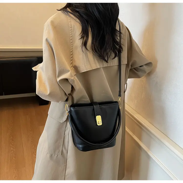 Women's Brown Leather Bucket Bag with Gold Plated Clasp — feature 22