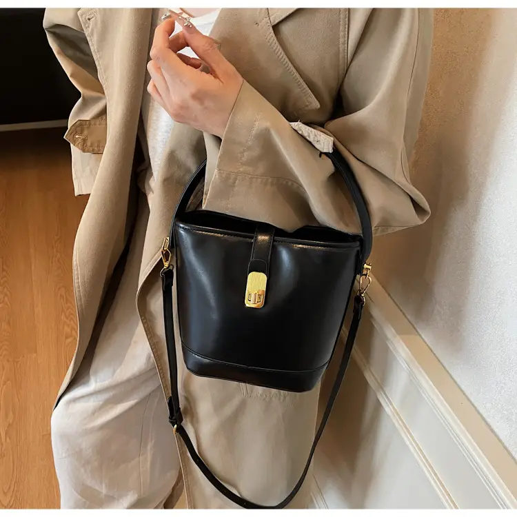 Women's Brown Leather Bucket Bag with Gold Plated Clasp — feature 23