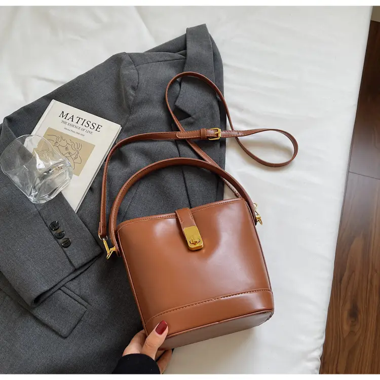 Women's Brown Leather Bucket Bag with Gold Plated Clasp — feature 26