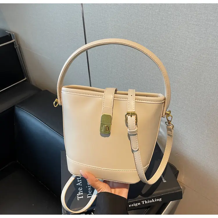 Women's Brown Leather Bucket Bag with Gold Plated Clasp — feature 27