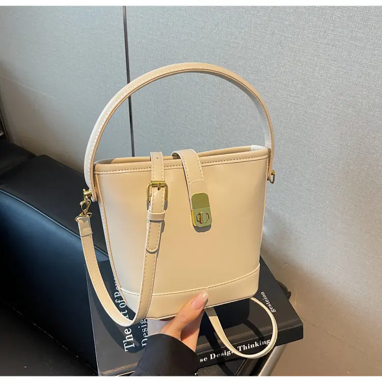 Women's Brown Leather Bucket Bag with Gold Plated Clasp — feature 28