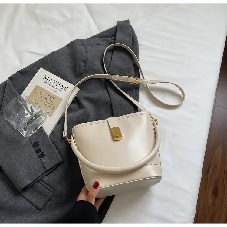 Women's Brown Leather Bucket Bag with Gold Plated Clasp — feature 29