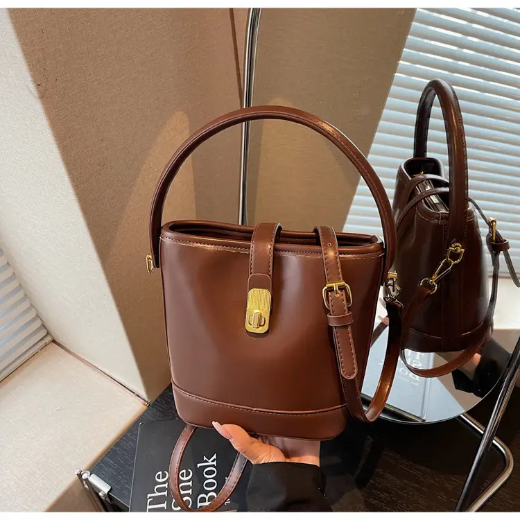 Women's Brown Leather Bucket Bag with Gold Plated Clasp — feature 30