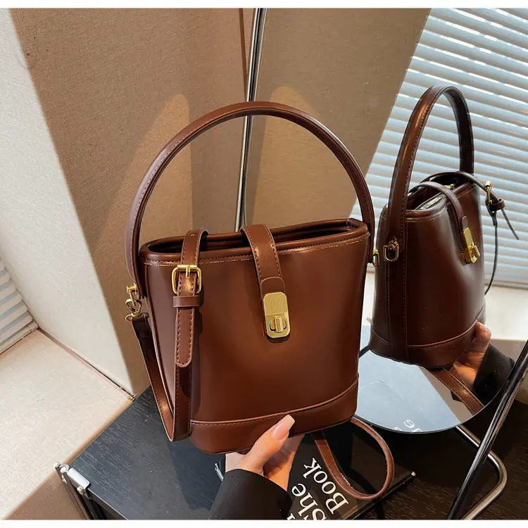Women's Brown Leather Bucket Bag with Gold Plated Clasp — feature 31