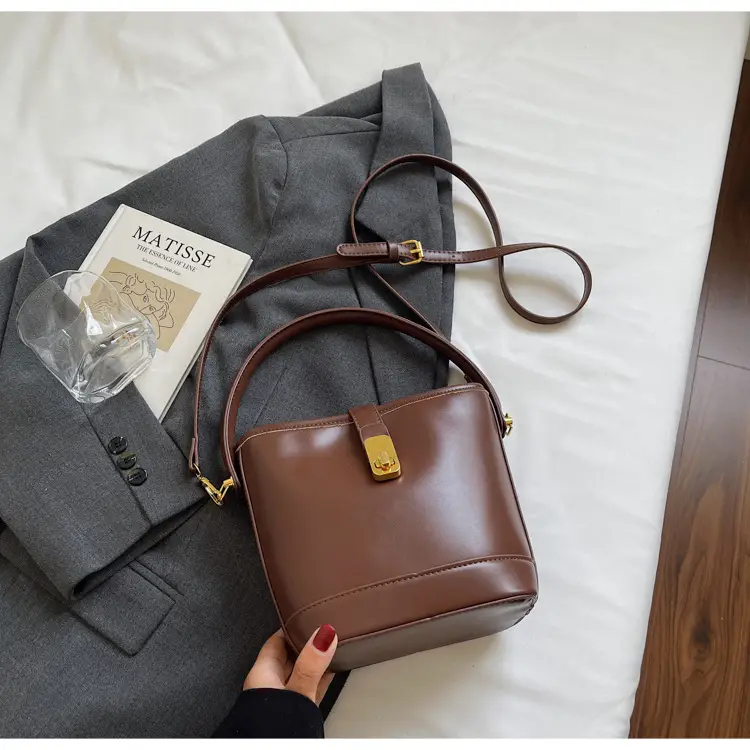 Women's Brown Leather Bucket Bag with Gold Plated Clasp — feature 32