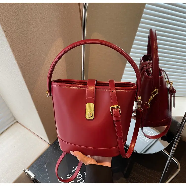 Women's Brown Leather Bucket Bag with Gold Plated Clasp — feature 33