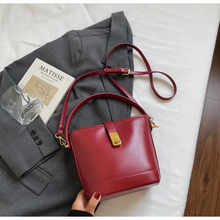 Women's Brown Leather Bucket Bag with Gold Plated Clasp — feature 35