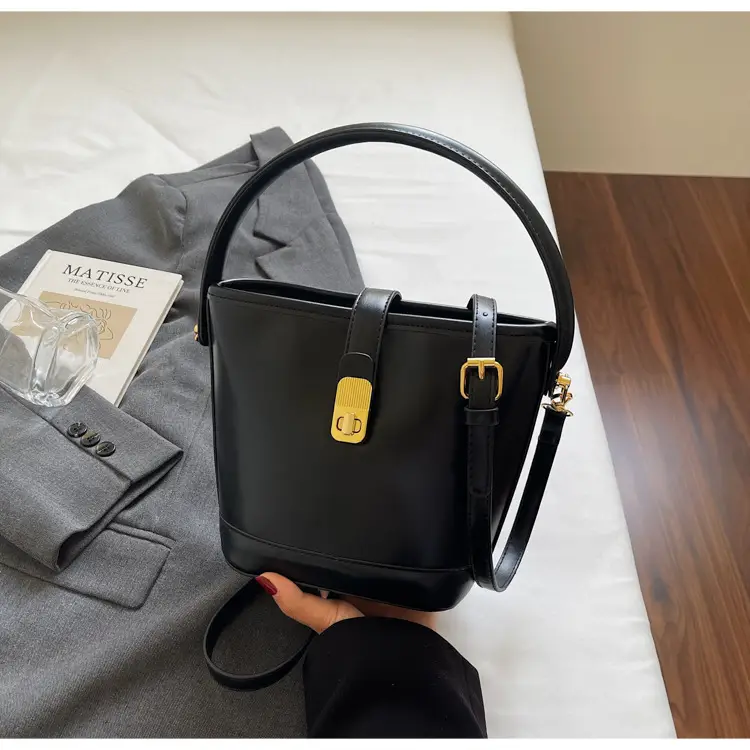 Women's Brown Leather Bucket Bag with Gold Plated Clasp — feature 36