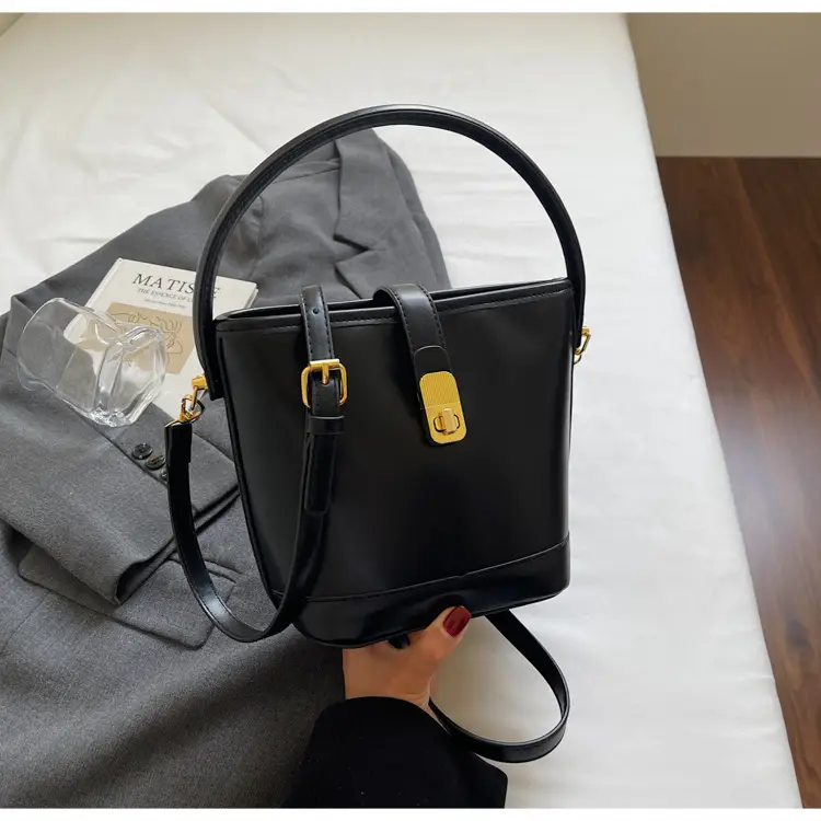 Women's Brown Leather Bucket Bag with Gold Plated Clasp — feature 37