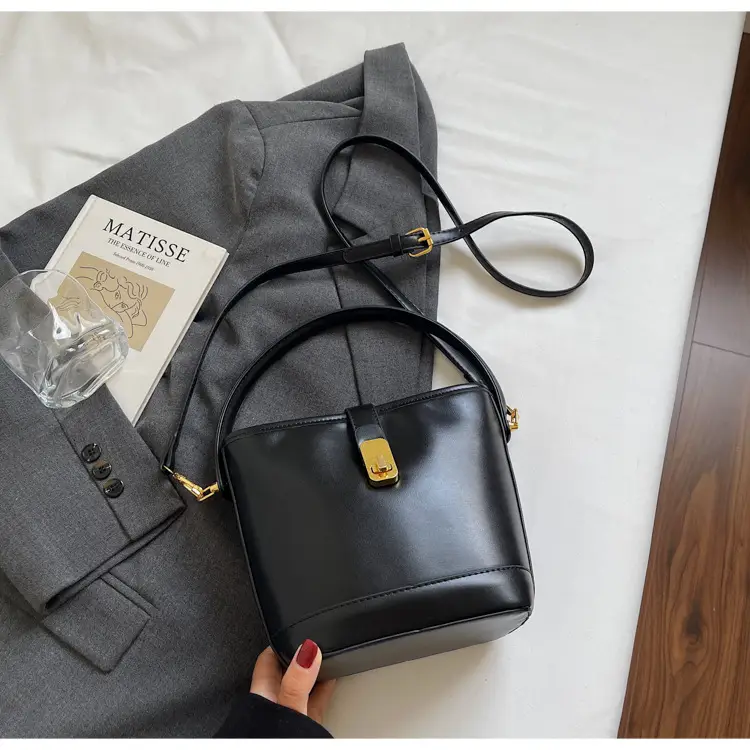 Women's Brown Leather Bucket Bag with Gold Plated Clasp — feature 38