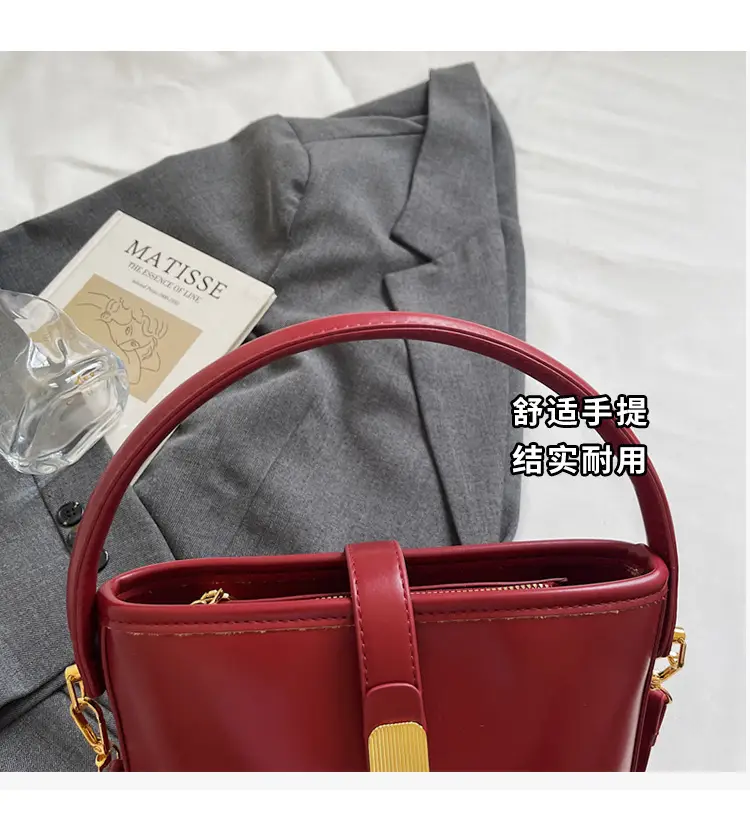 Women's Brown Leather Bucket Bag with Gold Plated Clasp — feature 6