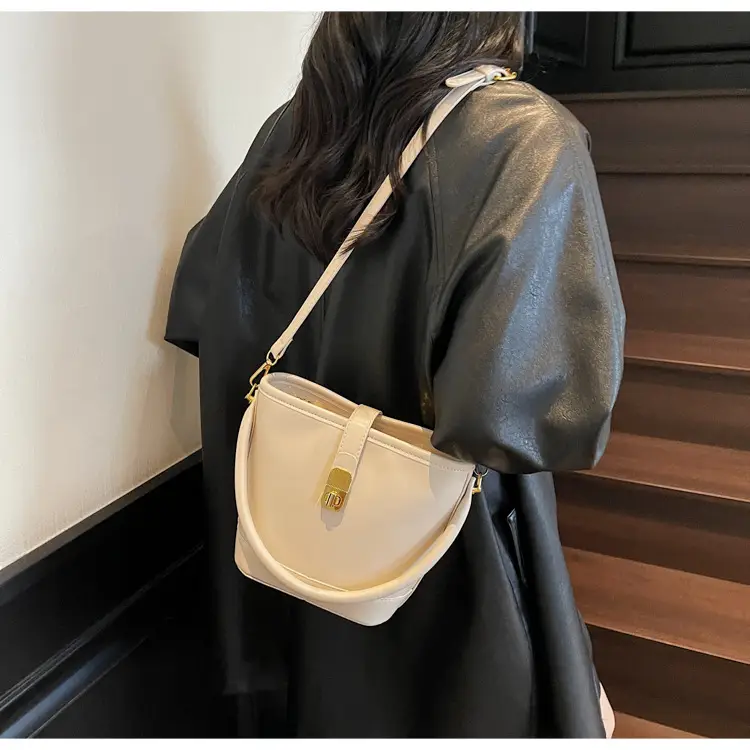 Women's Brown Leather Bucket Bag with Gold Plated Clasp — feature 9