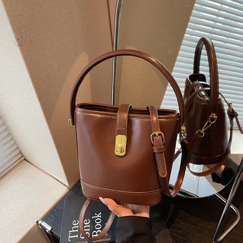 Women's Brown Leather Bucket Bag with Gold Plated Clasp