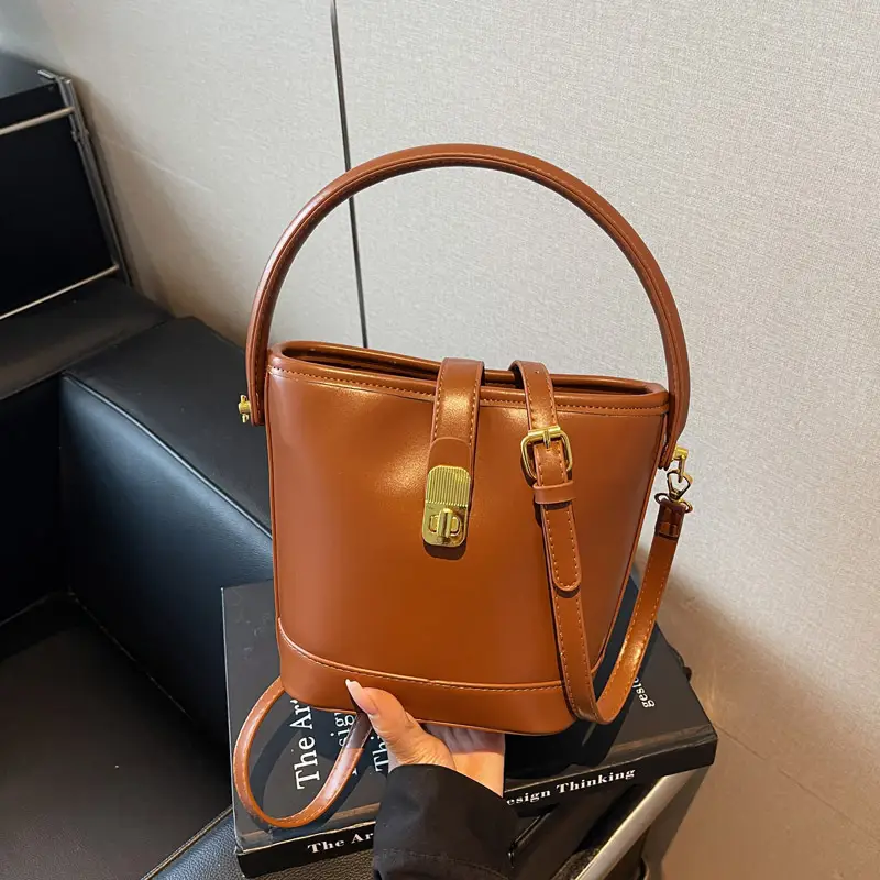 Women's Brown Leather Bucket Bag with Gold Plated Clasp
