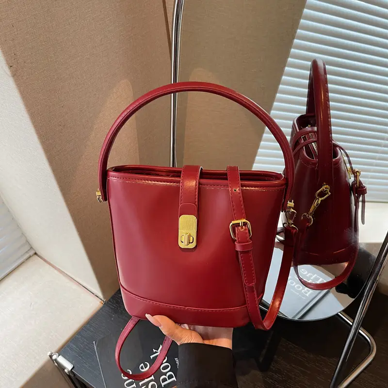 Women's Brown Leather Bucket Bag with Gold Plated Clasp