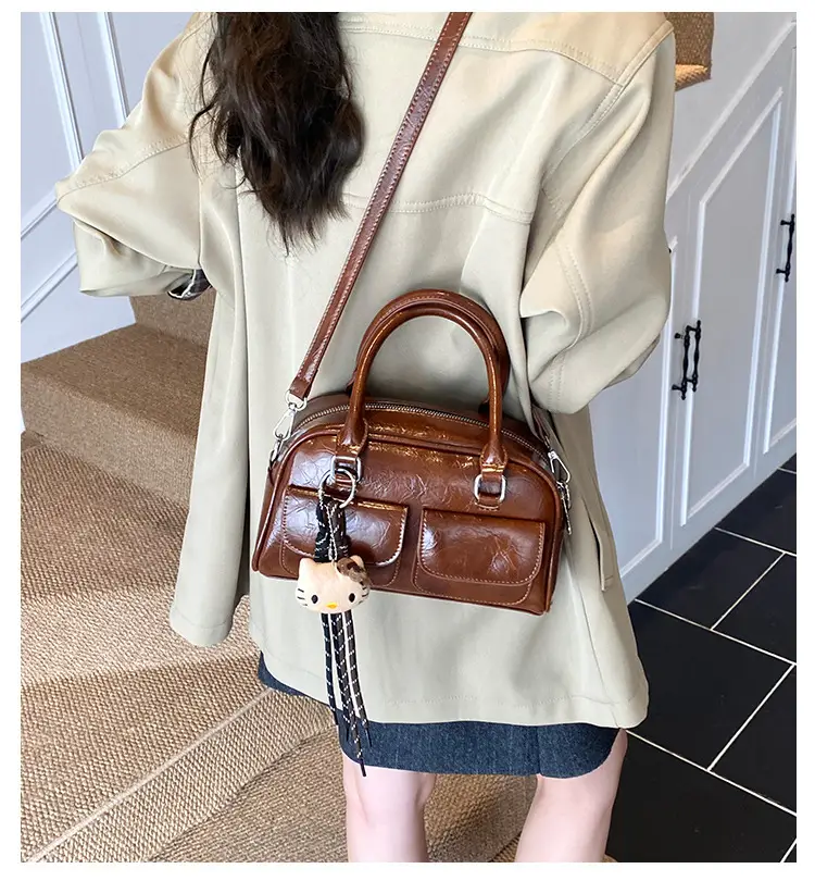 Women's Brown Leather Bowling Bag with Chain Strap — feature 1
