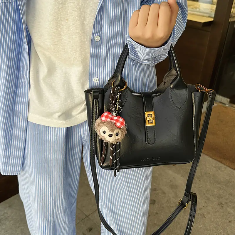 Women's Brown Leather Shoulder Bag with Cute Charm - Image 6