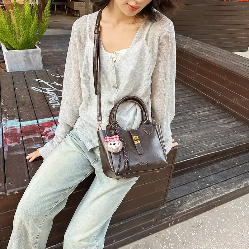 Women's Brown Leather Shoulder Bag with Cute Charm - Image 7