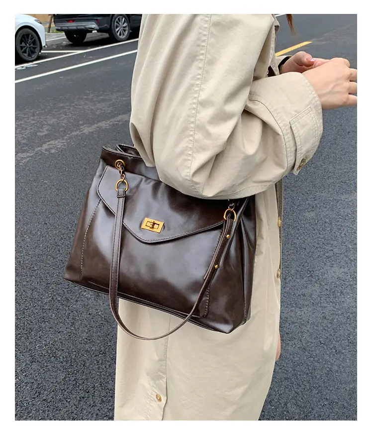 Black Leather Shoulder Bag with Gold Chain — feature 13