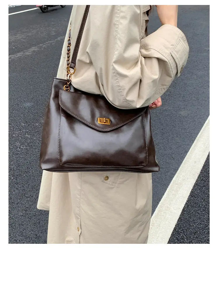 Black Leather Shoulder Bag with Gold Chain — feature 19