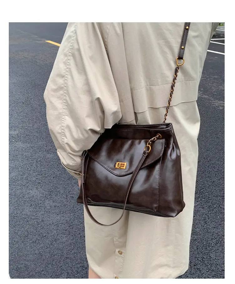 Black Leather Shoulder Bag with Gold Chain — feature 20