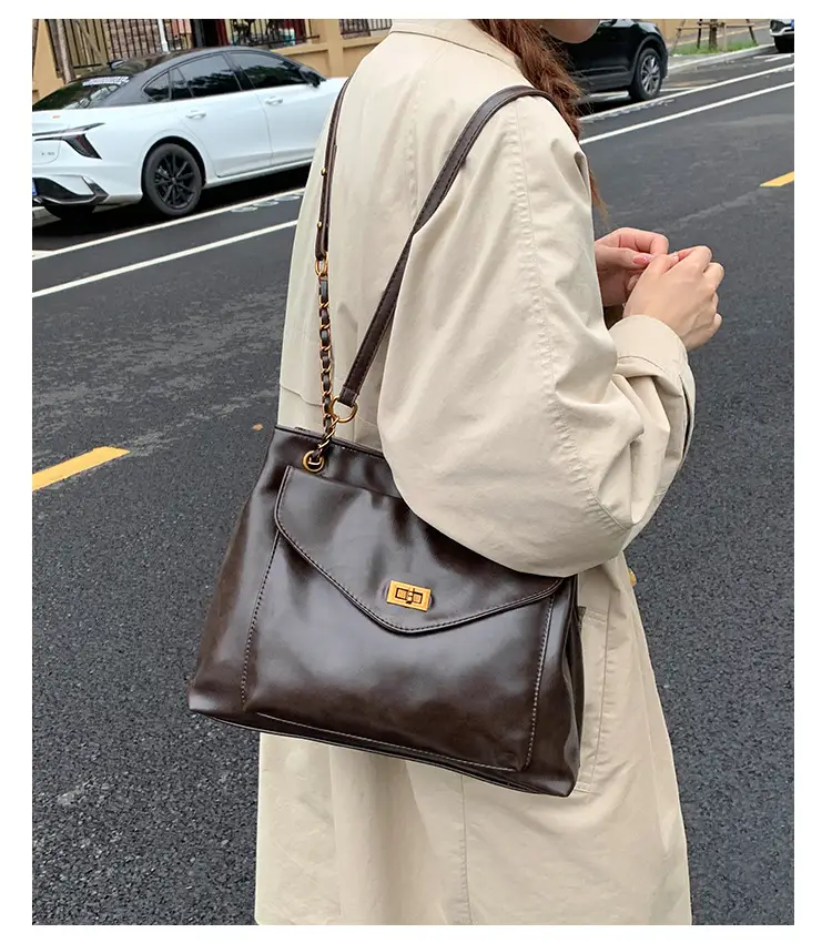 Black Leather Shoulder Bag with Gold Chain — feature 21