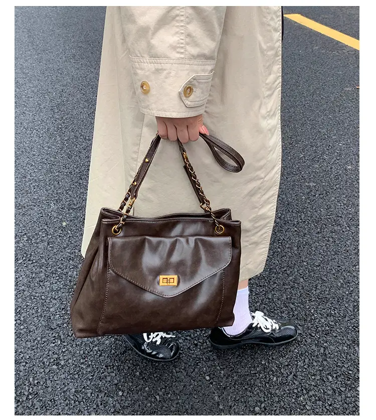 Black Leather Shoulder Bag with Gold Chain — feature 22