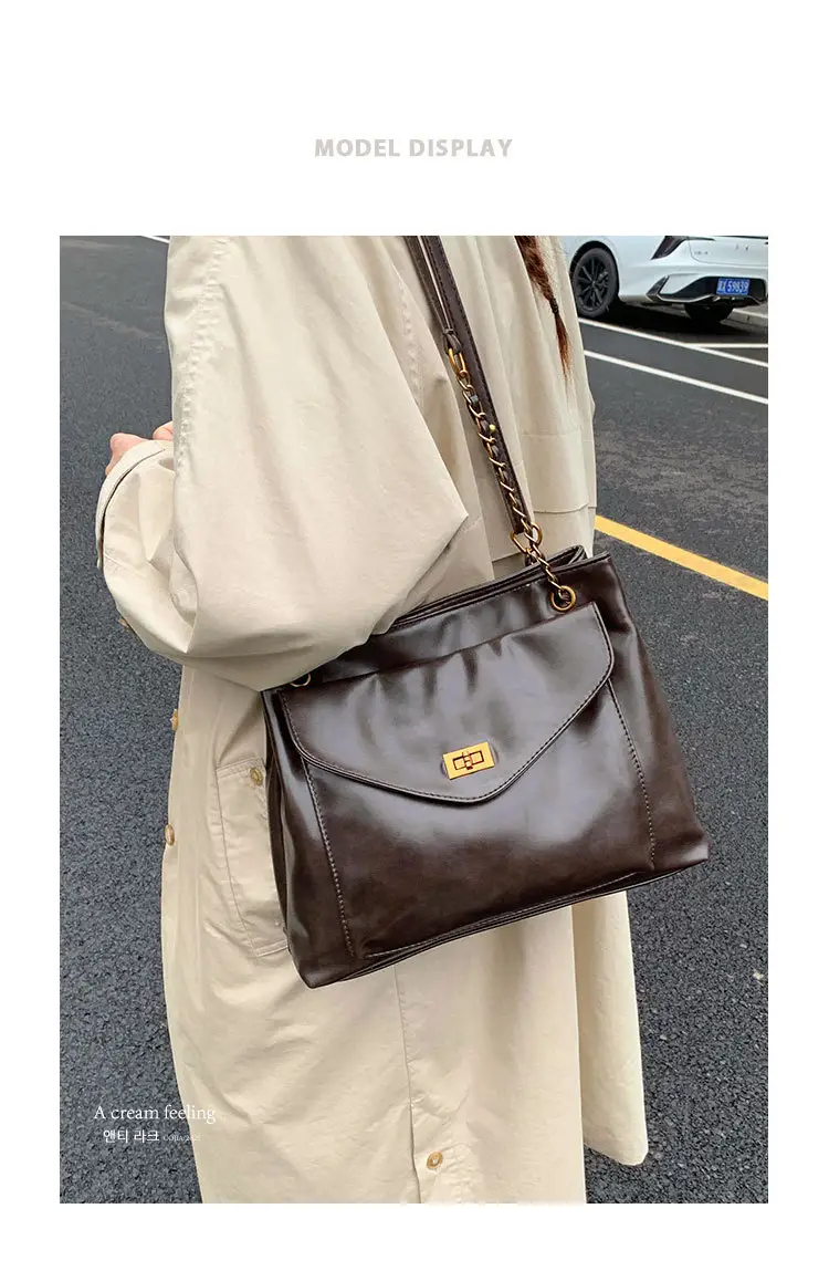 Black Leather Shoulder Bag with Gold Chain — feature 3