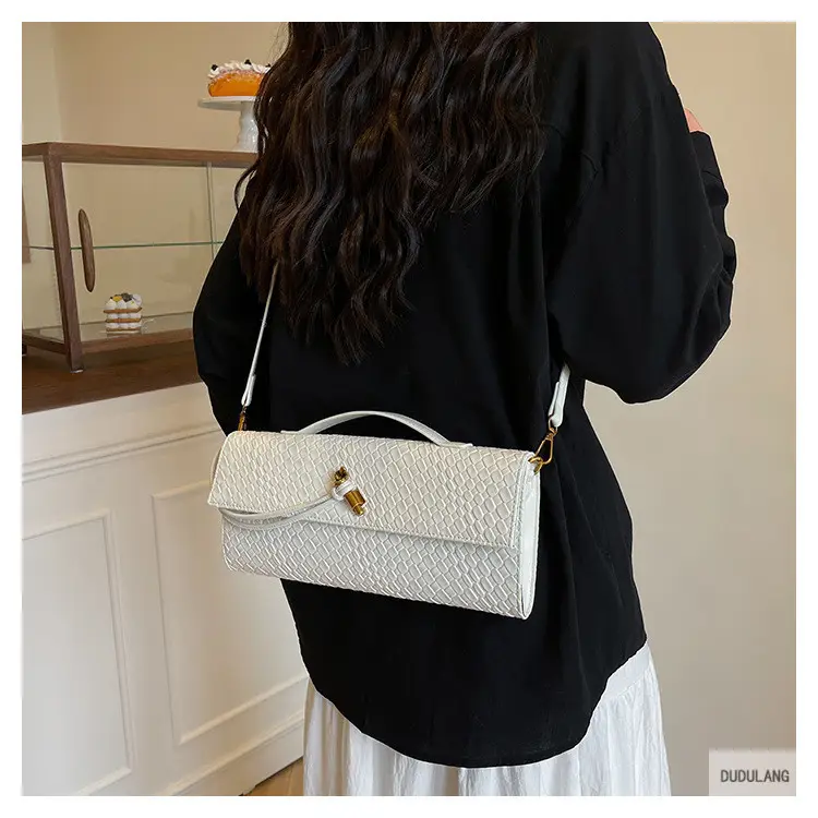 Gold Woven Crossbody Bag with Leather Trim — feature 33