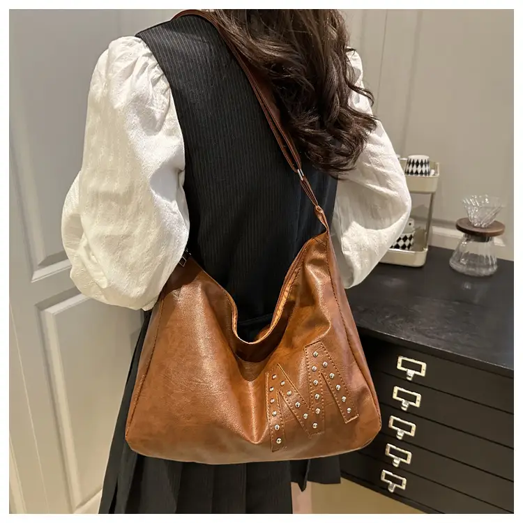 Vintage Brown Leather Shoulder Bag with Studded Design — feature 10