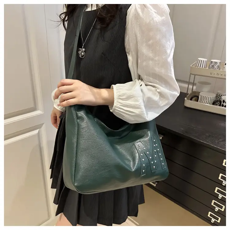 Vintage Brown Leather Shoulder Bag with Studded Design — feature 13