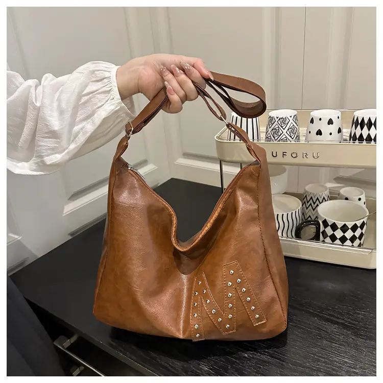 Vintage Brown Leather Shoulder Bag with Studded Design — feature 8