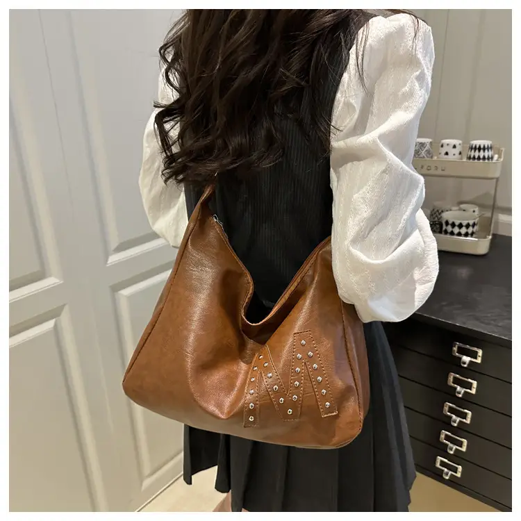 Vintage Brown Leather Shoulder Bag with Studded Design — feature 9