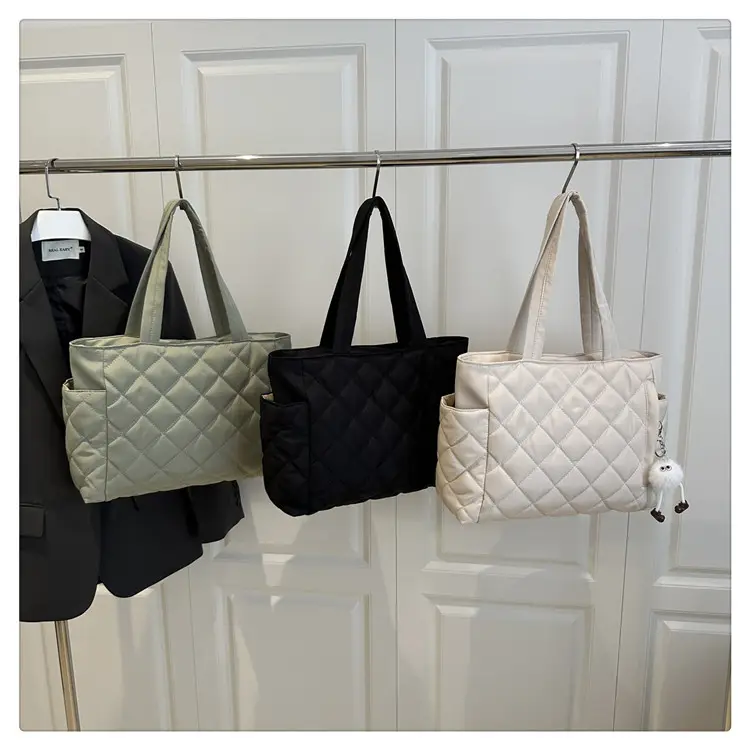 Black Quilted Women's Shoulder Bag with Pom Pom Charm - Image 8