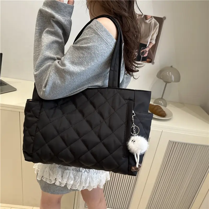 Black Quilted Women's Shoulder Bag with Pom Pom Charm - Image 9