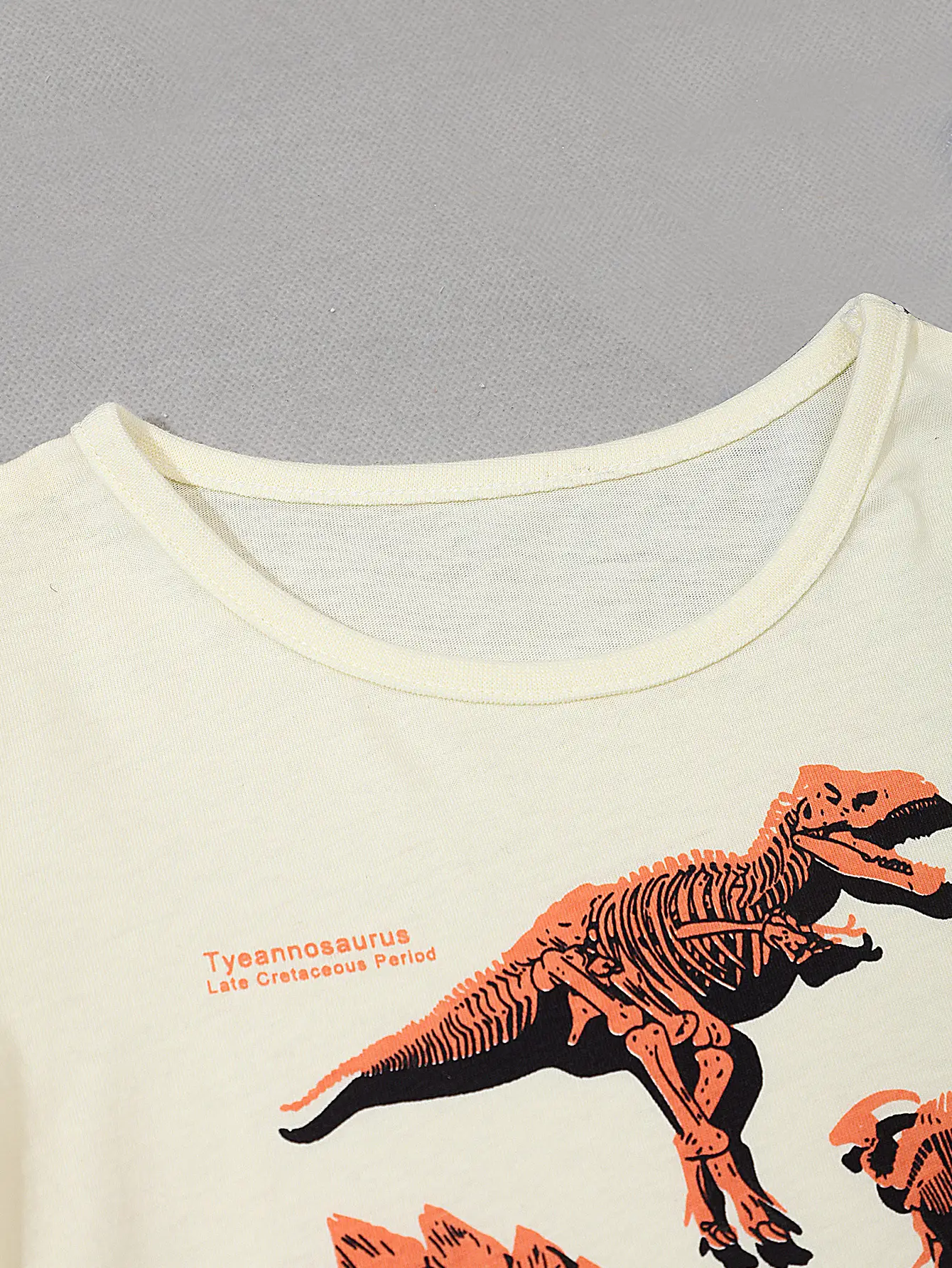 25Yr Old Cartoon Dinosaur T-Shirt Cream Round Neck - Image 4