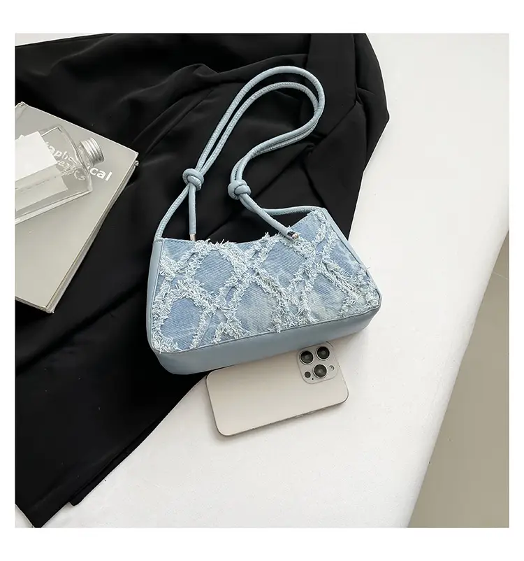 2026 Black Crescent Shoulder Bag with White Embroidery — feature 10