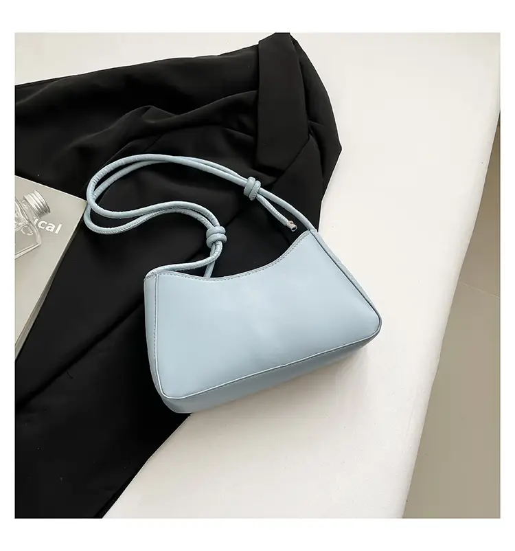 2026 Black Crescent Shoulder Bag with White Embroidery — feature 11